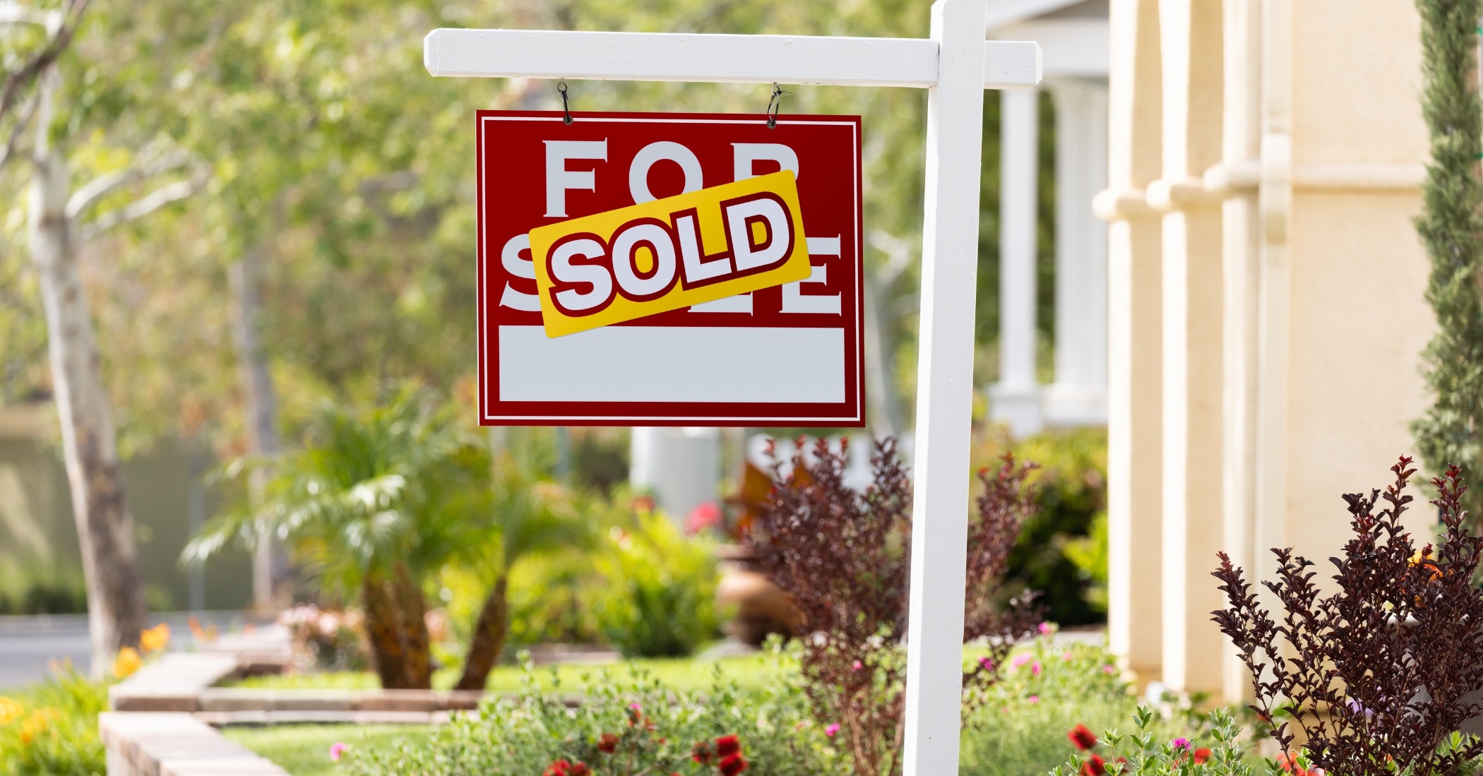 Sold sign in front of property