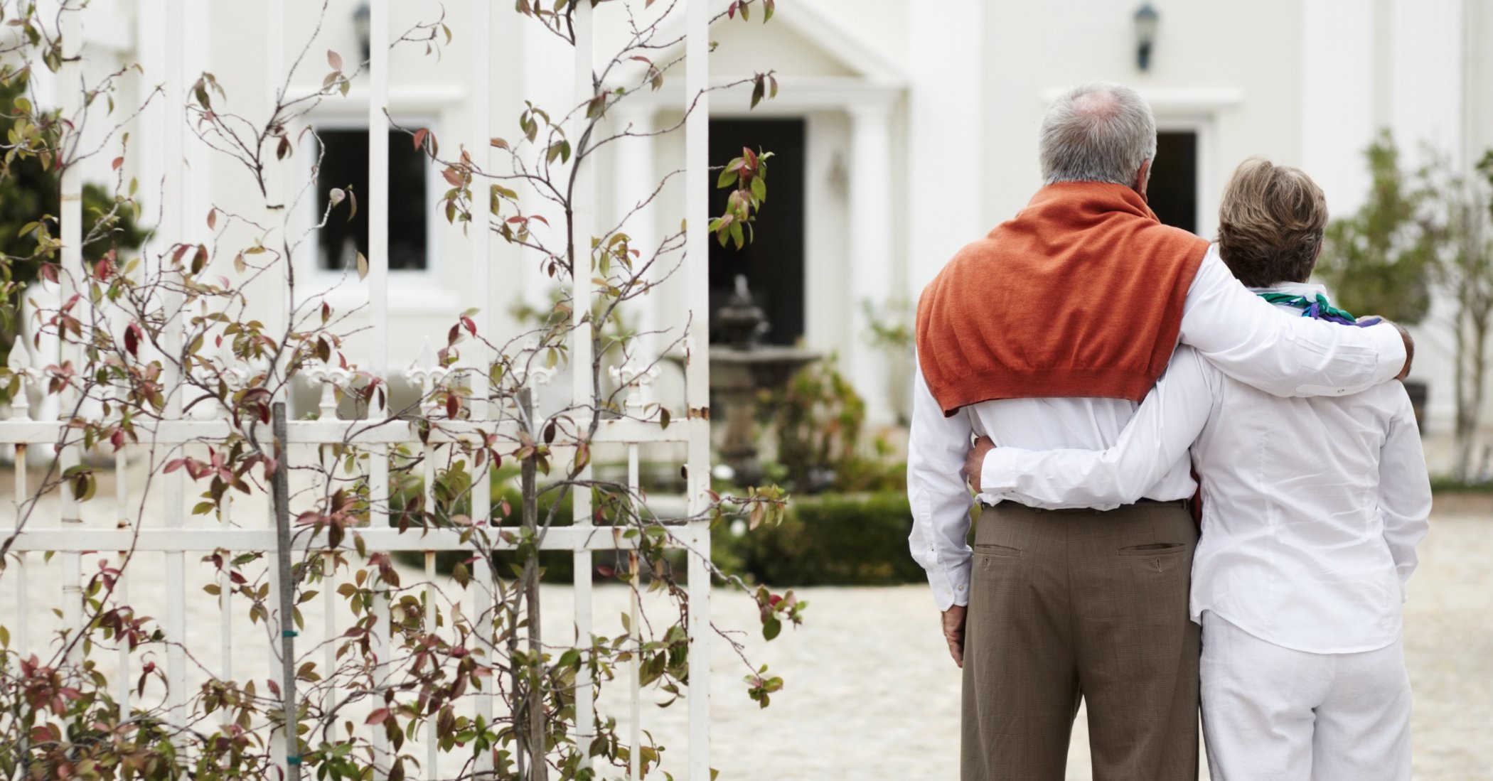 Retiring couple looking at home