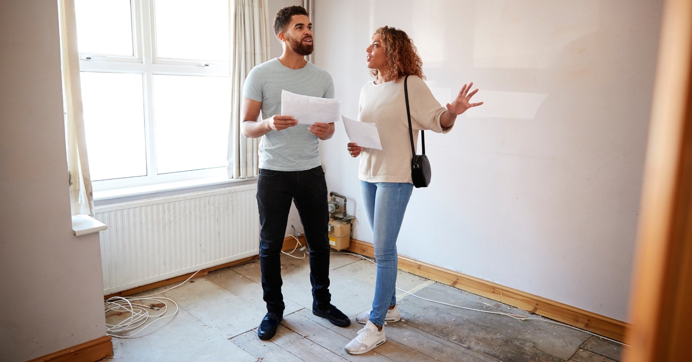 Couple inspecting property as part of due diligence