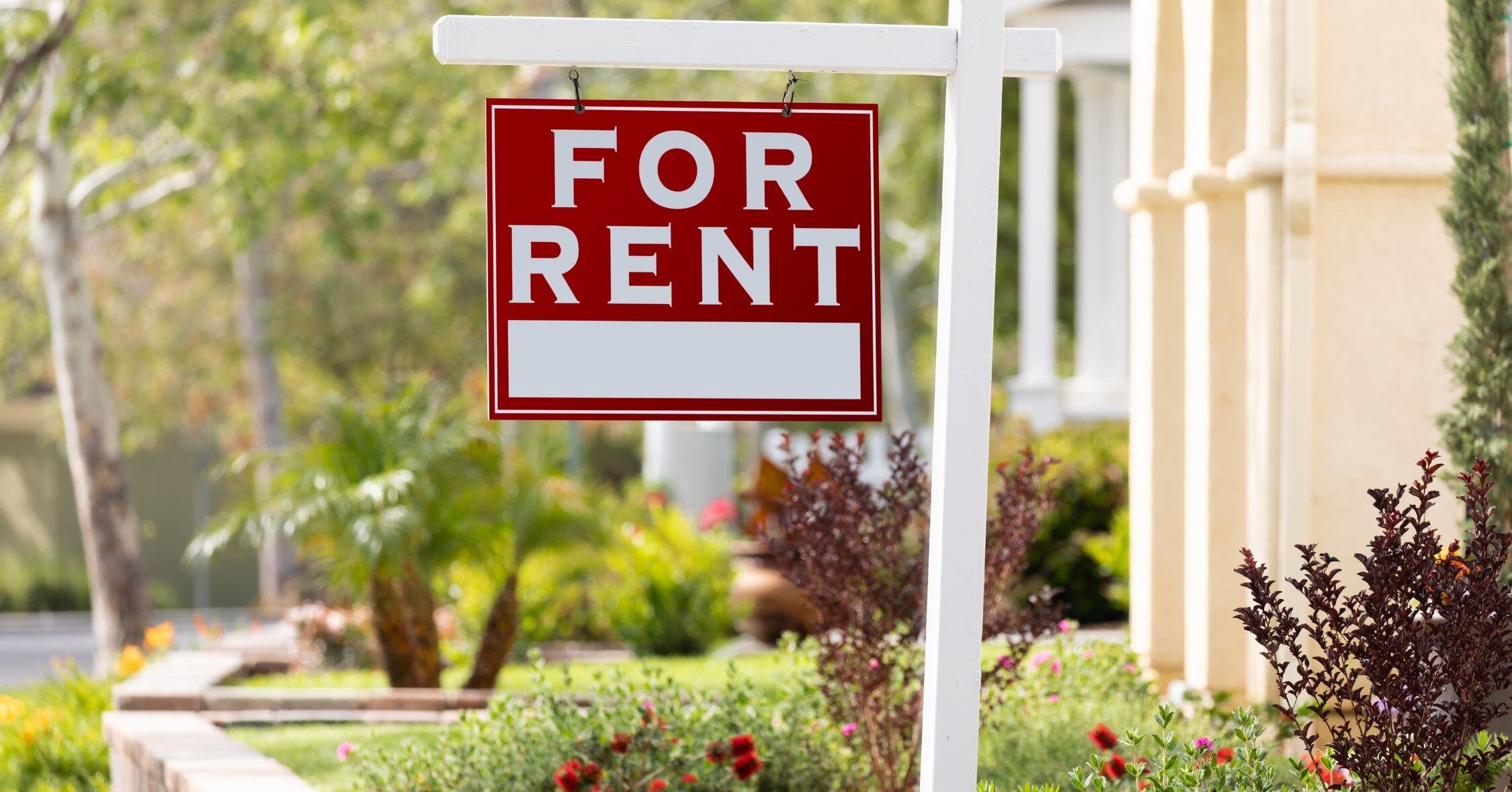 For Lease sign in front of rental property