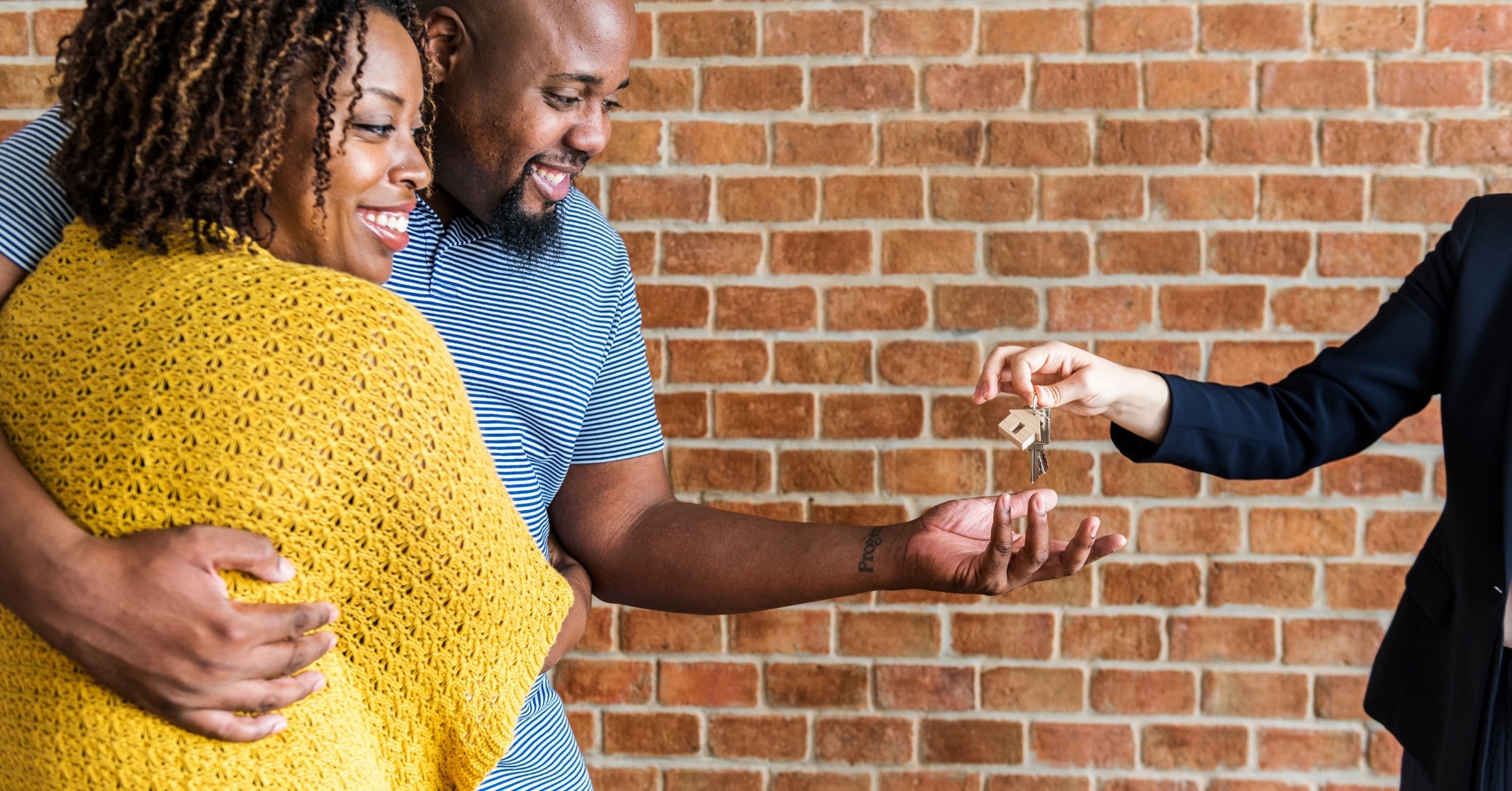 Buyers getting keys to a new home